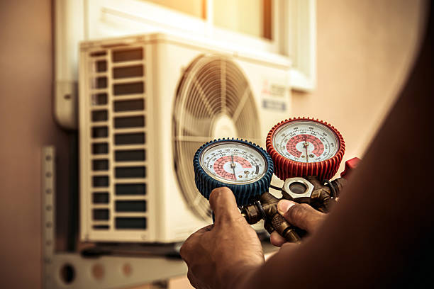 Professional Air Conditioning Service technician working in New Hill, NC